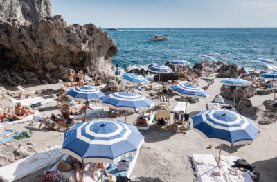 la fontelina sunbathers with blue umbrellas 2017